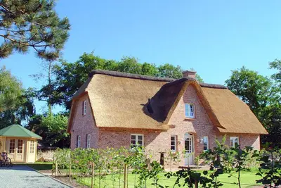 Image de Hus Specht - beautiful thatched house in a privileged location and close to the village center.