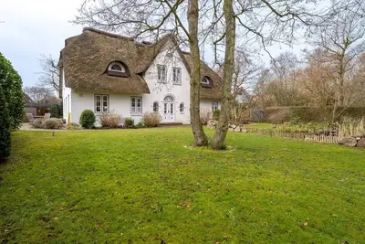 Image de Nordlicht Luv - beautiful thatched house and dreamlike garden.