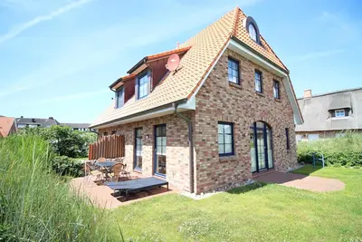 Image de Seahorse - beautiful half of a house near the beach in Ording