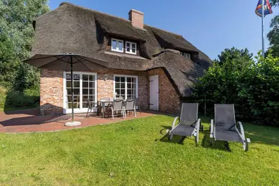 Image de Strandkontor - beautiful thatched house in the Ording district