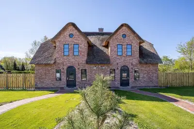 Image de Reetperle Ost - Beautiful half of a house with high-quality furnishings