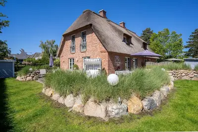 Image de Kleine Krabbe - Reethaushälfte with high-quality equipment in a quiet location.
