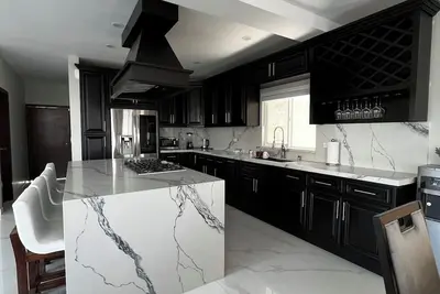 Image de Beautiful home 5 min away from papas & beer. W/ King size beds