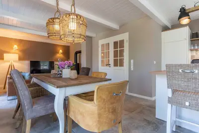 Image de Under thatch I - Dreamlike thatched house with high-quality furnishings