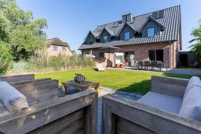 Image de Huus WittdĂĽn - Modern semi-detached house with exclusive furniture