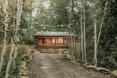 Image de 76gs - Genuine Log Cabin - WiFi - Pets Ok - Sleeps 4 by RedAwning