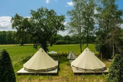 Image de Spend the night in a cozy bell tent overlooking the meadows!