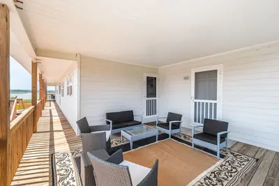 Image de Sunrise | Covered Porch + Walk to the Beach!