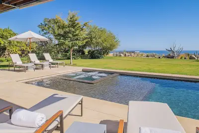 West Enclave 8: 1 Row Back from Staircase to Beach on Grounds of Luxury Resort.