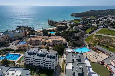 Image de Joli appartement pour 4 personnes avec climatisation, piscine, Wifi, Tv, terrasse et parking