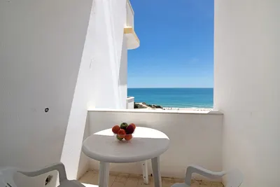 Image de Appartement Torre Sol 705 - Vista Mar, sur la plage, vue mer, piscine, jardin et balcon.