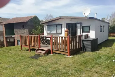 Image de Mobilome type chalet avec terrasse 15 metres carré, vue sur montagne avoisinante