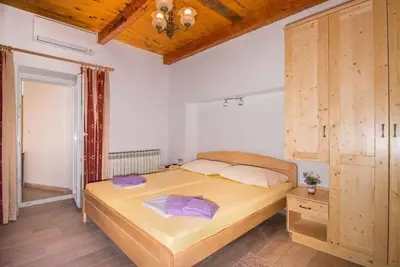 Image de Appartement de vacances Avec air conditionné et terrasse