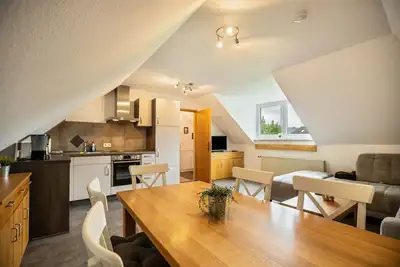 Image de Appartement de vacances 'Nordsee Ferienwohnung Möwe' avec jardin et Wi-Fi.