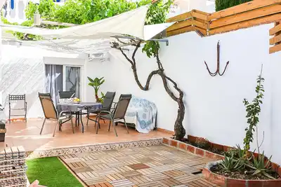 Image de Apartamento con Patio Privado Junto al mar