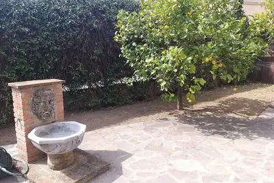 Image de Apartment in the center with garden and parking space