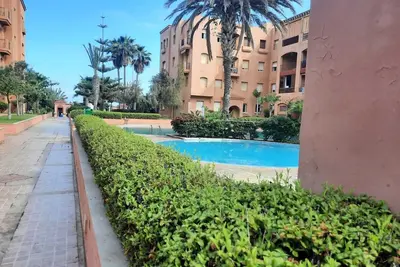 Image de Charmente appartement avec piscine Ă 5 minutes de la plage!