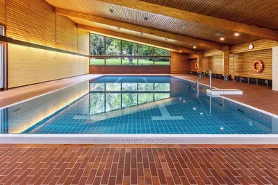 Image de Appartement \"Fetscher 2\" avec vue sur le lac, piscine, sauna et Wi-Fi