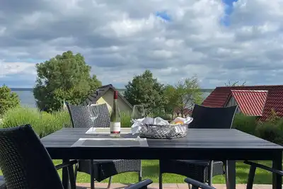 Image de Herberge Seensucht Fewo Fleesensee ground floor with lake view