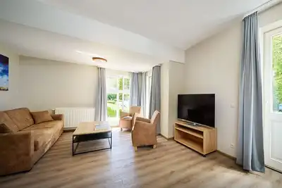 Image de Grand appartement avec vue mer et étapes à la plage de sable
