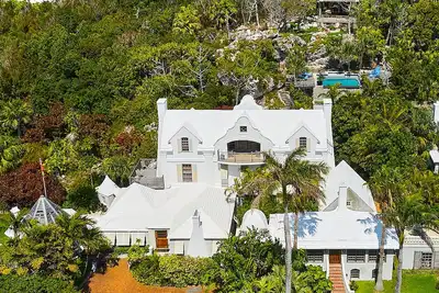 Extraordinary Bermuda retreat w\/large cave, panoramic pool and viewing deck.