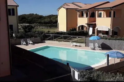 Image de House \"Mimosa \"50 meters from the sea, with swimming pool, Village Baia delle Mimose, Badesi