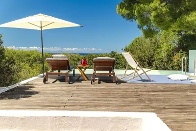 Image de Villa à Porto Pino avec 5 chambres à coucher, 10 couchages