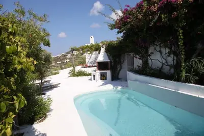 Image de Domes, flowers and a small, cool pool