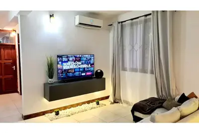 Image de A luxurious 2 bedroom apartment w/ a king size bed