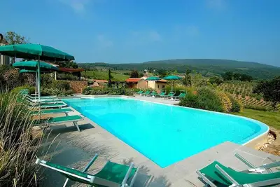 Image de Appartement Reginaldo C: Un appartement élégant et accueillant qui fait partie d'une villa dans le style caractéristique de la campagne toscane.