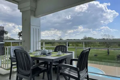 Image de Confortable appartement avec piscine, golf, et parking