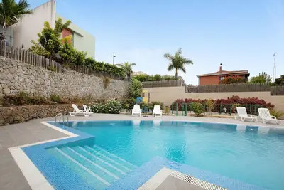 Image de Maison de vacances 'La Quinta Adosado' avec vue sur mer, piscine partagée et Wi-Fi.