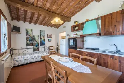 Image de Appartement \"Trilocale Etrusco\" avec piscine partagée, jardin et Wi-Fi