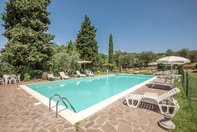 Image de Appartement de vacances \"Bilocale Brando\" avec piscine, jardin et Wi-Fi.