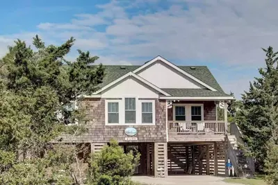 Image de Come Seas the day at this beautiful beach house!