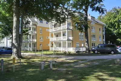 Image de Ferienwohnung W14. 1. s - Moderne Ferienwohnung in Bester Strandlage mit Schönem Balkon und Kaminofen!
