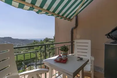 Image de Bel appartement pour 3 personnes avec piscine, Wifi, Tv, patio, animaux admis et parking