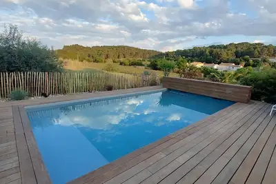 Image de Wooden house near Pézenas with swimming pool, petanque and table football!