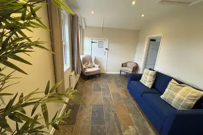 Image de Cosy Family Cottage. Sleeps 16. Close to the beach and town. Pet Friendly!