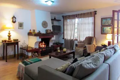 Image de Chalé com lareira e Wi-Fi em Campos do Jordão/Sp