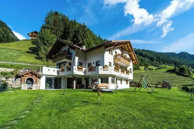 Image de Appartement de vacances 'Rauchkofel' avec jacuzzi commun & jardin