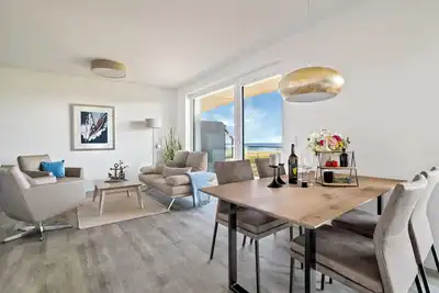 Image de \"BeachLoungeTwo\" vacation apartment on the beach with sun terrace, sauna & sea view