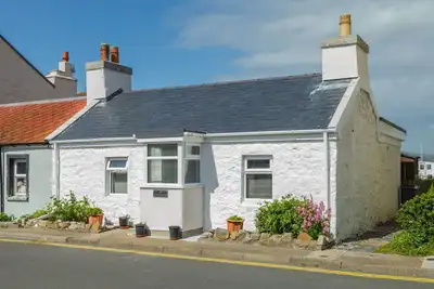 Image de Heather Cottage is a beautifully light and airy seaside cottage a stone's throw from the picture per