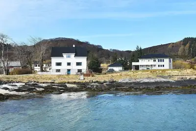 Image de Maison de vacances pour 8 a Bølandet-By Traum