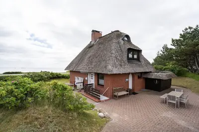 Image de Fantastic apartment under thatch for 5 people, sea view, parking space, Wlan.