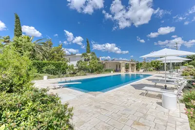 Image de Villa Gianna avec piscine partagée, jardin partagé et climatisation.