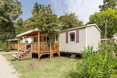 Image de Mobilhome 3 chambres, 2 salles de bain, Cap Ferret avec terrasse, court de tennis et barbecue