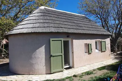 Image de Small house with garden, ideal for peace, sea and water sports