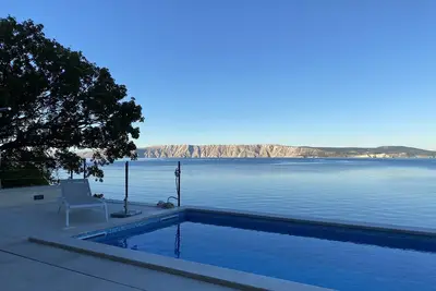 Image de Romantic villa right by the sea with heated private pool