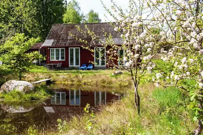 Image de Cottage by the pond in Bolmen, near the lake, canoe, sauna playhouse bicycles, Wi-Fi